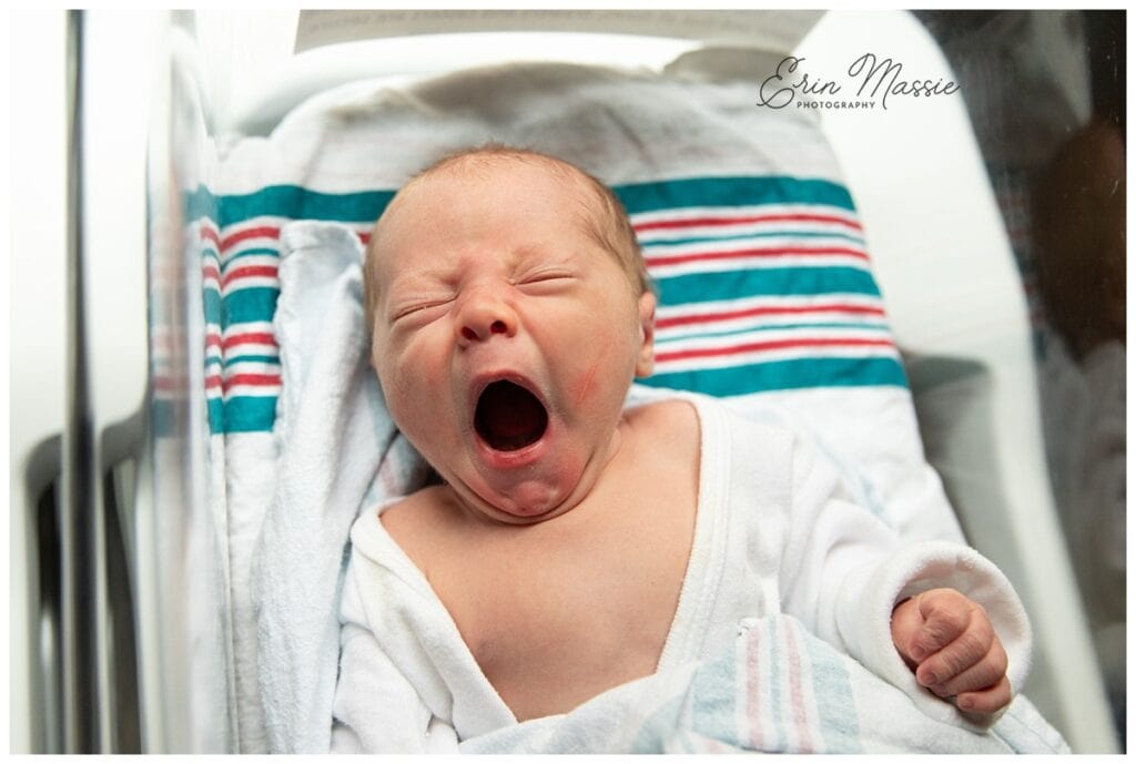newborn baby yawn in hospital bassinette during fresh 48 photo session